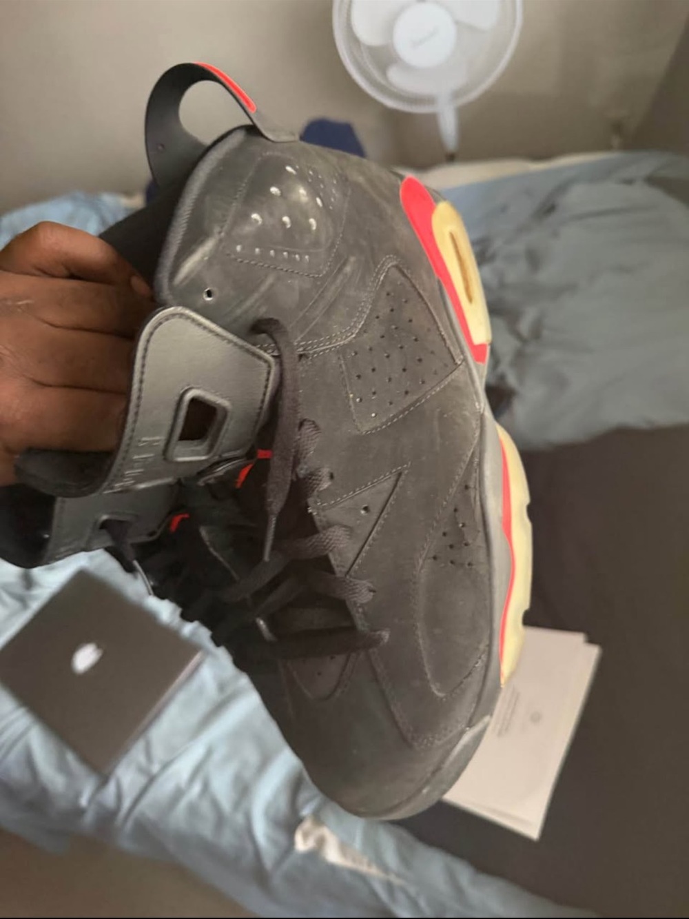 Jordan Retro 6 Sneakers in Black with Red and Cream Accents